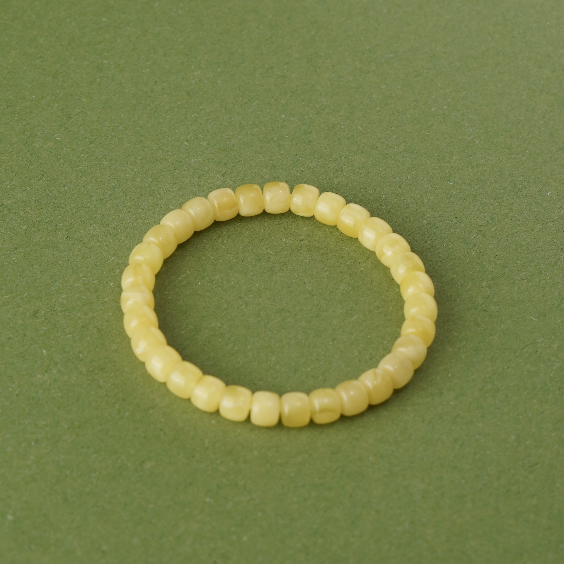 约7mm俄料精工归圆鸡油黄蜜蜡老型单圈手串