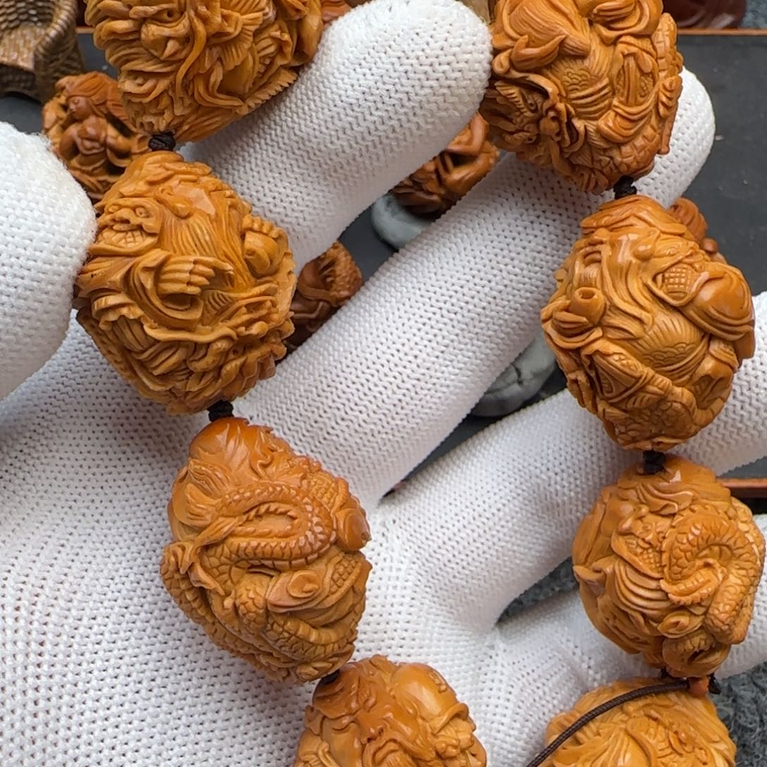 汽***尹橄榄核吊坠………………