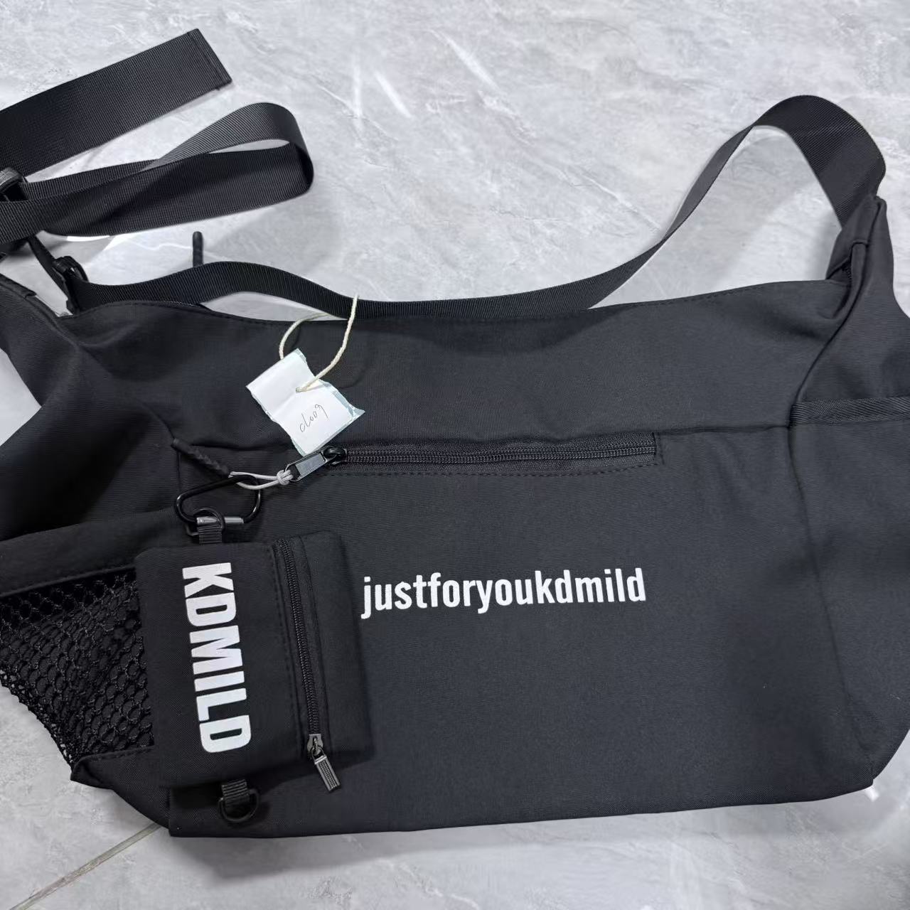 斜挎包男款运动大容量超轻日系2025新款休闲户外工装单肩包女背包