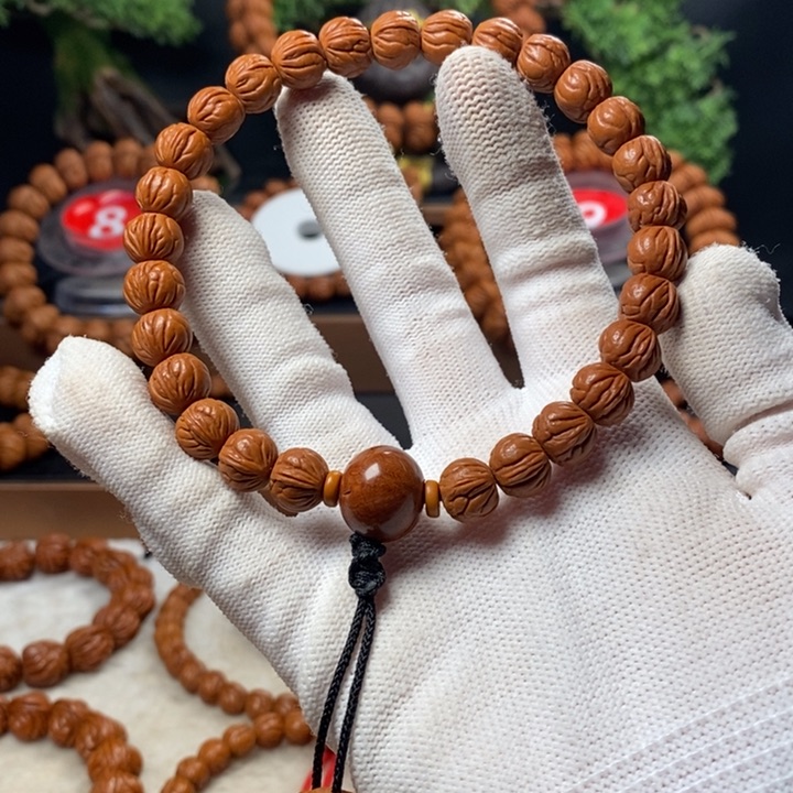 桃核吊坠走****航秦岭龙纹