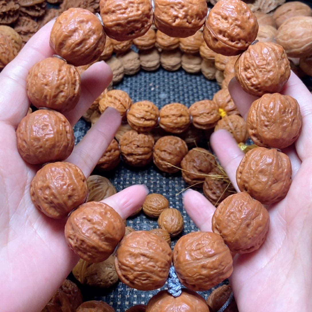 桃核吊坠光头足球手持