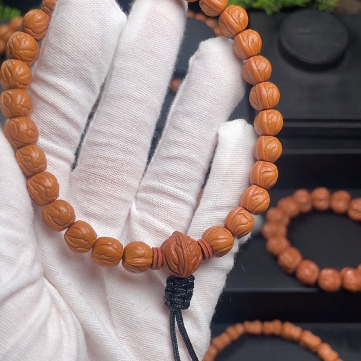 武***哥木质类精品桃核手持