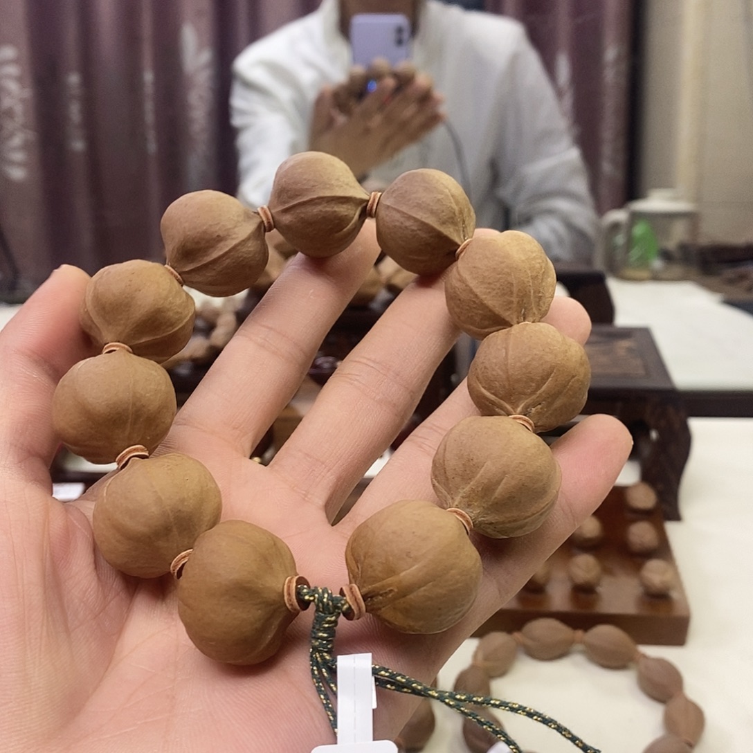 梦***？橄榄核手串/手链三花25-25