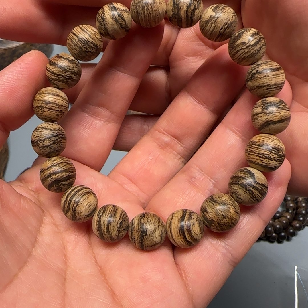 熊***猫手串沉香正达拉干千年碳化红土虎斑12.2克1.1