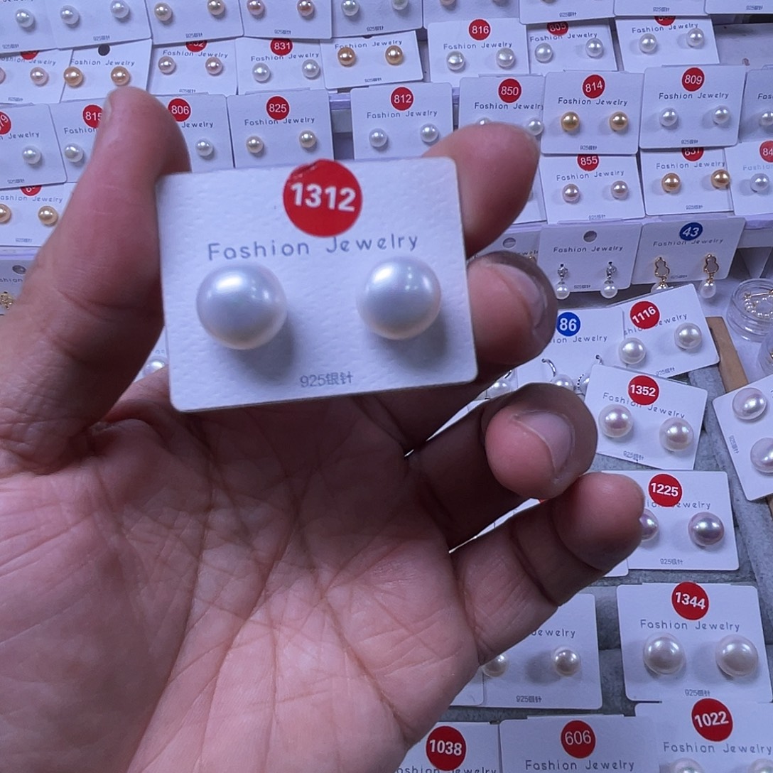 萍***逢淡水珍珠银S925镶嵌耳饰