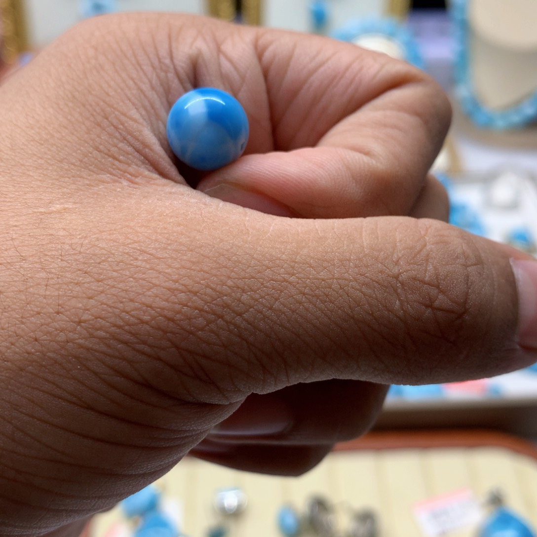 刘***闹针钠钙石（海纹石）未镶嵌珠宝半成品