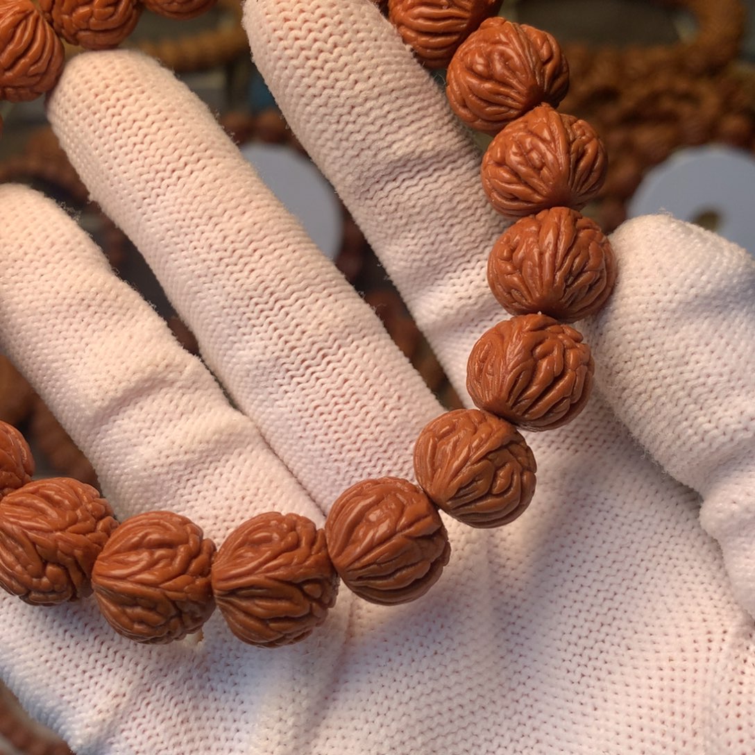 _***、桃核手串秦岭龙纹