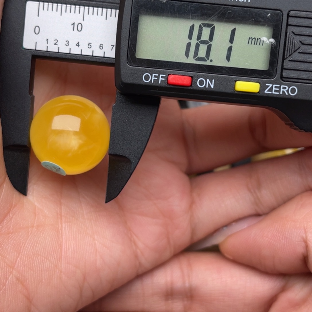 哈***唐琥珀未镶嵌裸石蜜蜡圆珠静