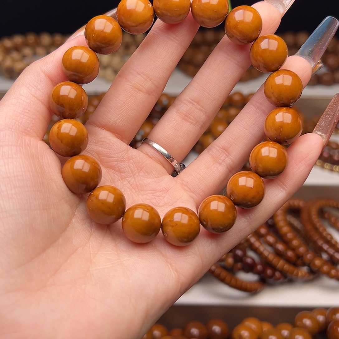 刘***瑞紫金鼠手串13光珠