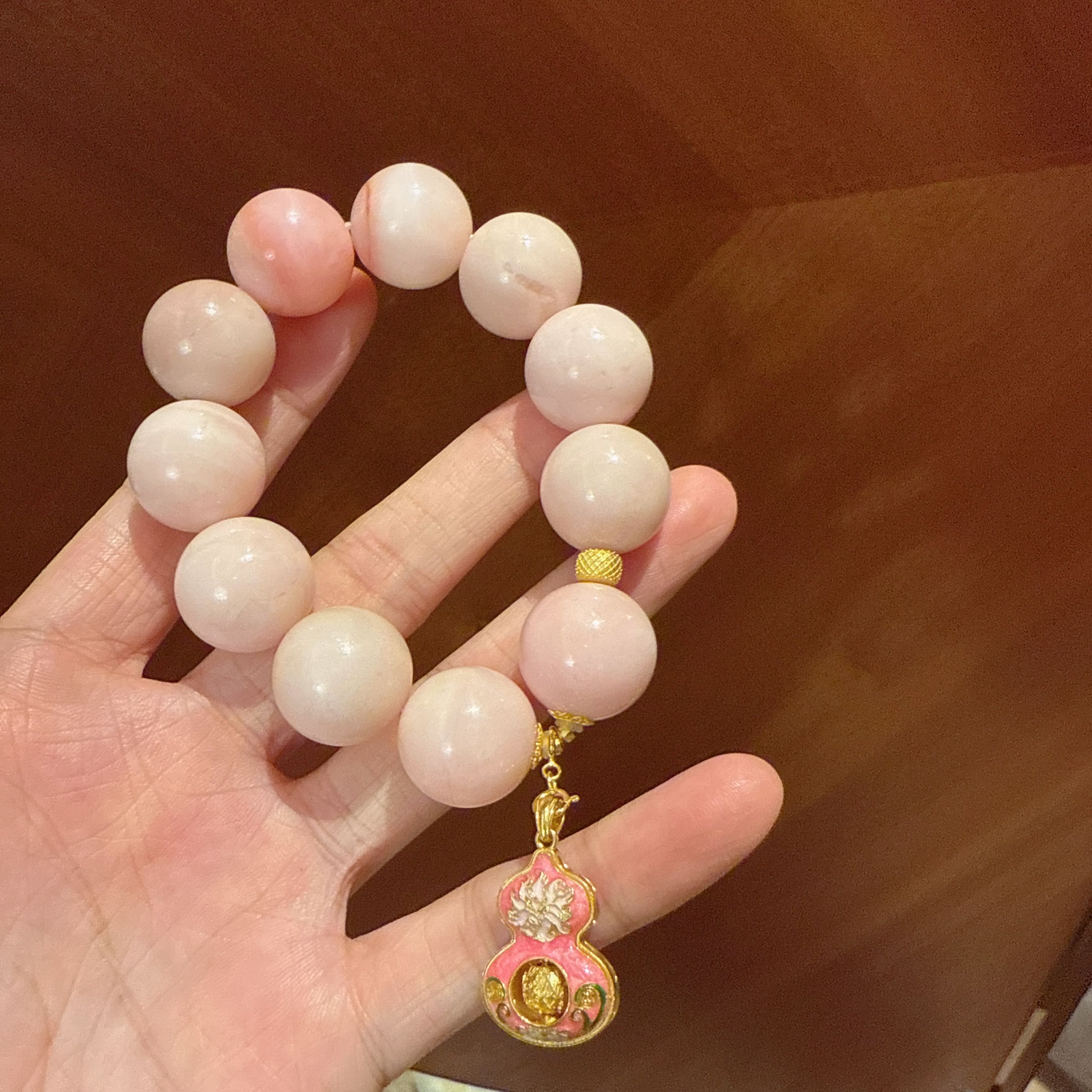 A009未镶嵌粉澳宝手串25220