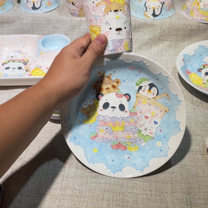熙***熙瓷片预定可乐杯盘子上面的画面
