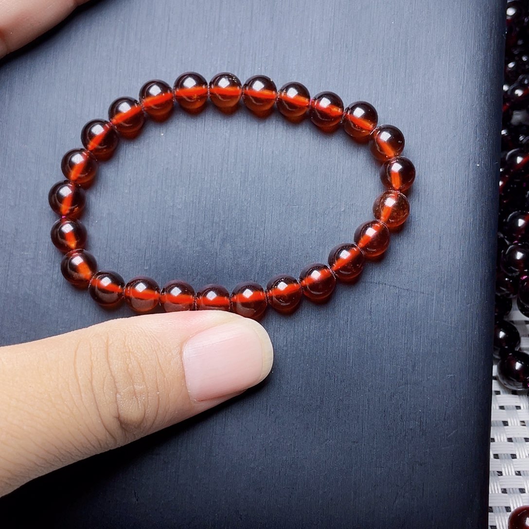 是***啊未镶嵌石榴石手链6MM高品质橙红单圈9A级