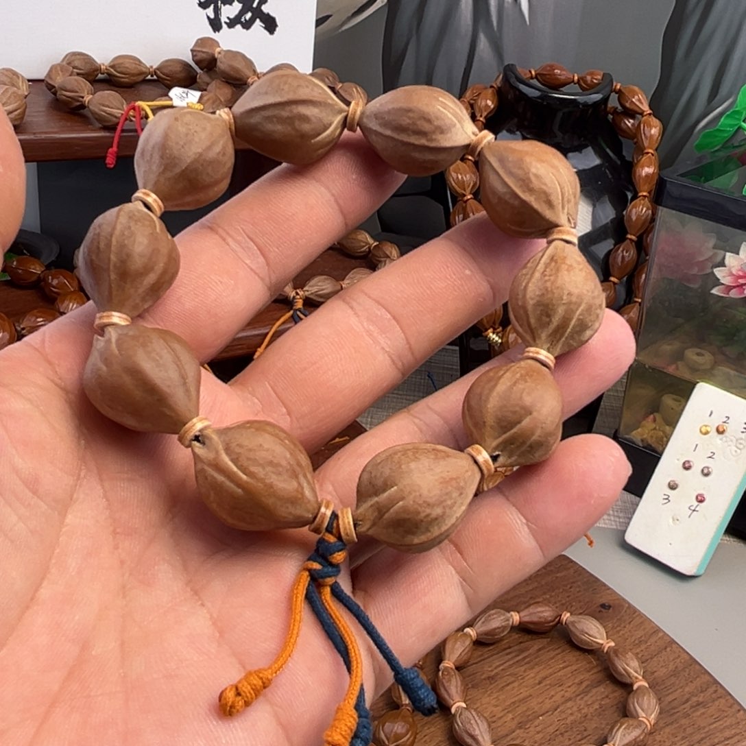 大***n手串橄榄核三面佛