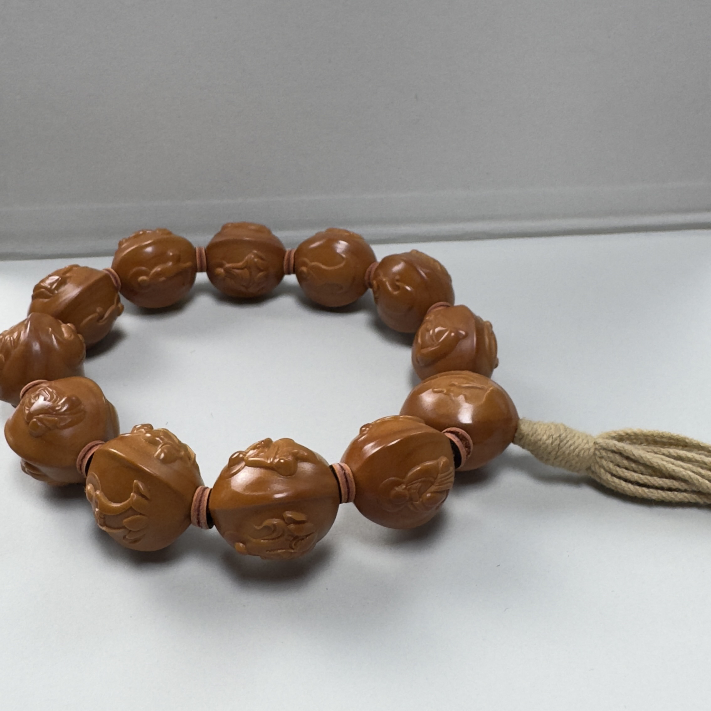 橄榄核无相佛手串 铁核鲨鱼背雕刻三面佛