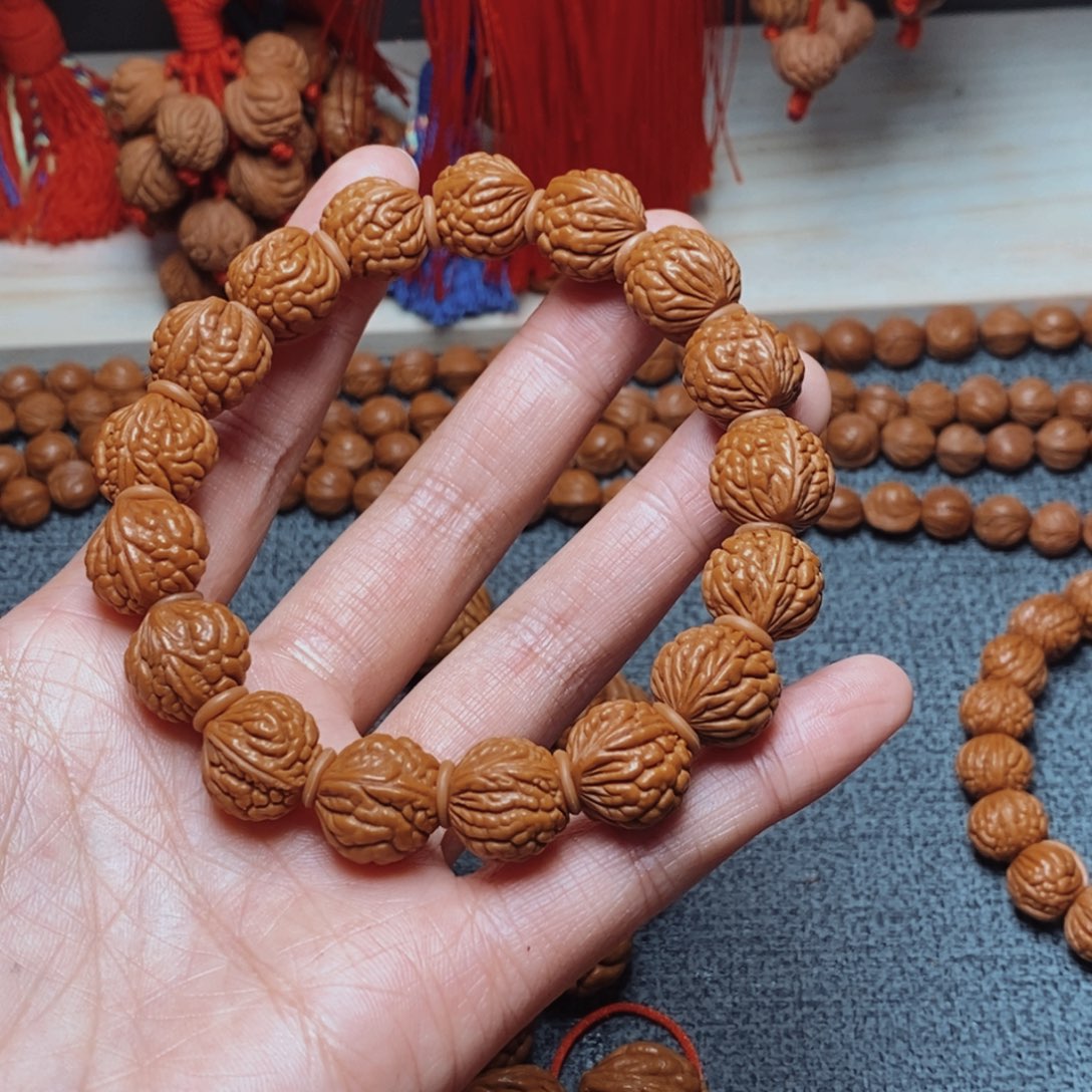 蓝***黍桃核吊坠桃枭手串1