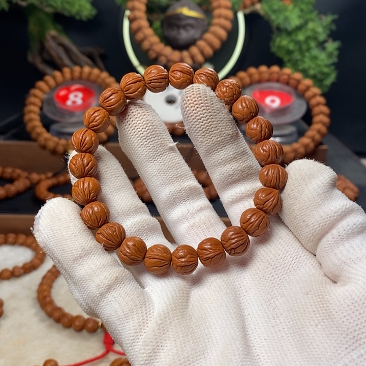 桃核吊坠郭**?秦岭龙纹