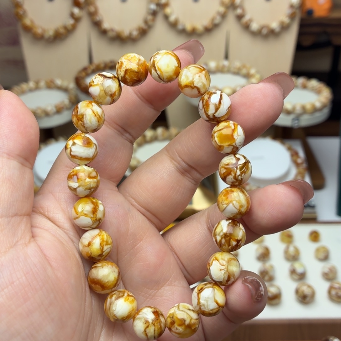 夸***了10mm沁色圆珠手串一条