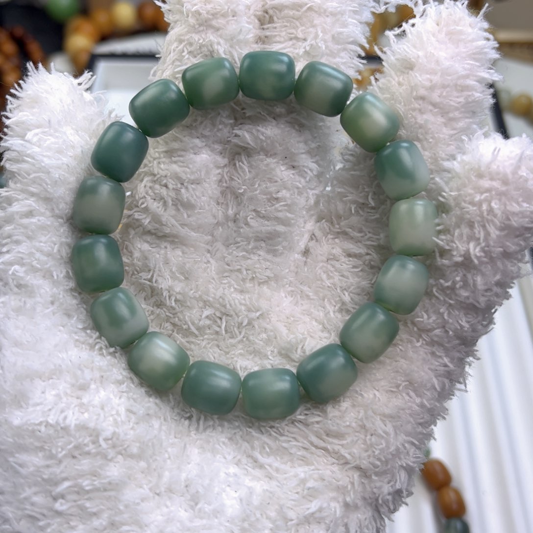 菩提根/象牙果手串辣****绣干磨