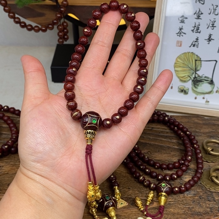 凤眼菩提吊坠8.5 带钉手持