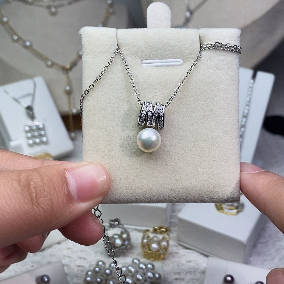 淡水珍珠银S925镶嵌耳饰