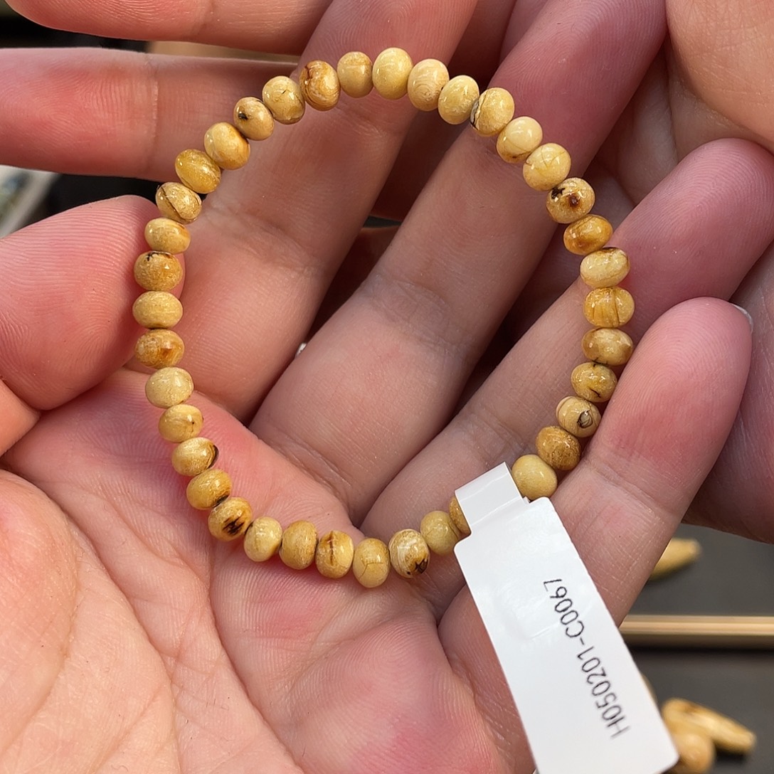 米***豆琥珀未镶嵌裸石5mm干白