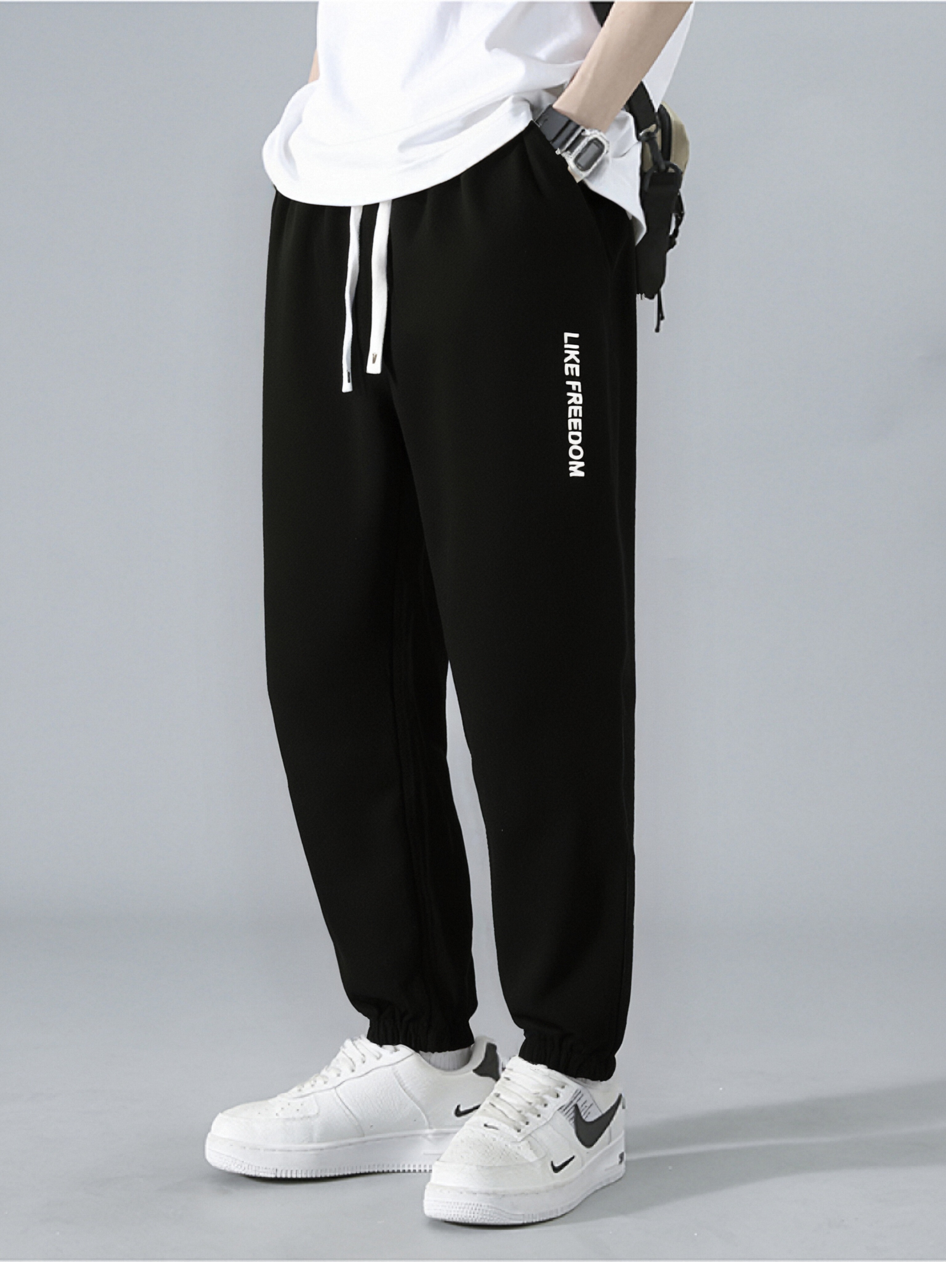 黑色简约松紧腰男女同款时尚束脚休闲裤潮流减龄百搭休闲裤1F887