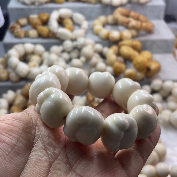 吊坠菩提根/象牙果全品象牙果熊抓手串卡21