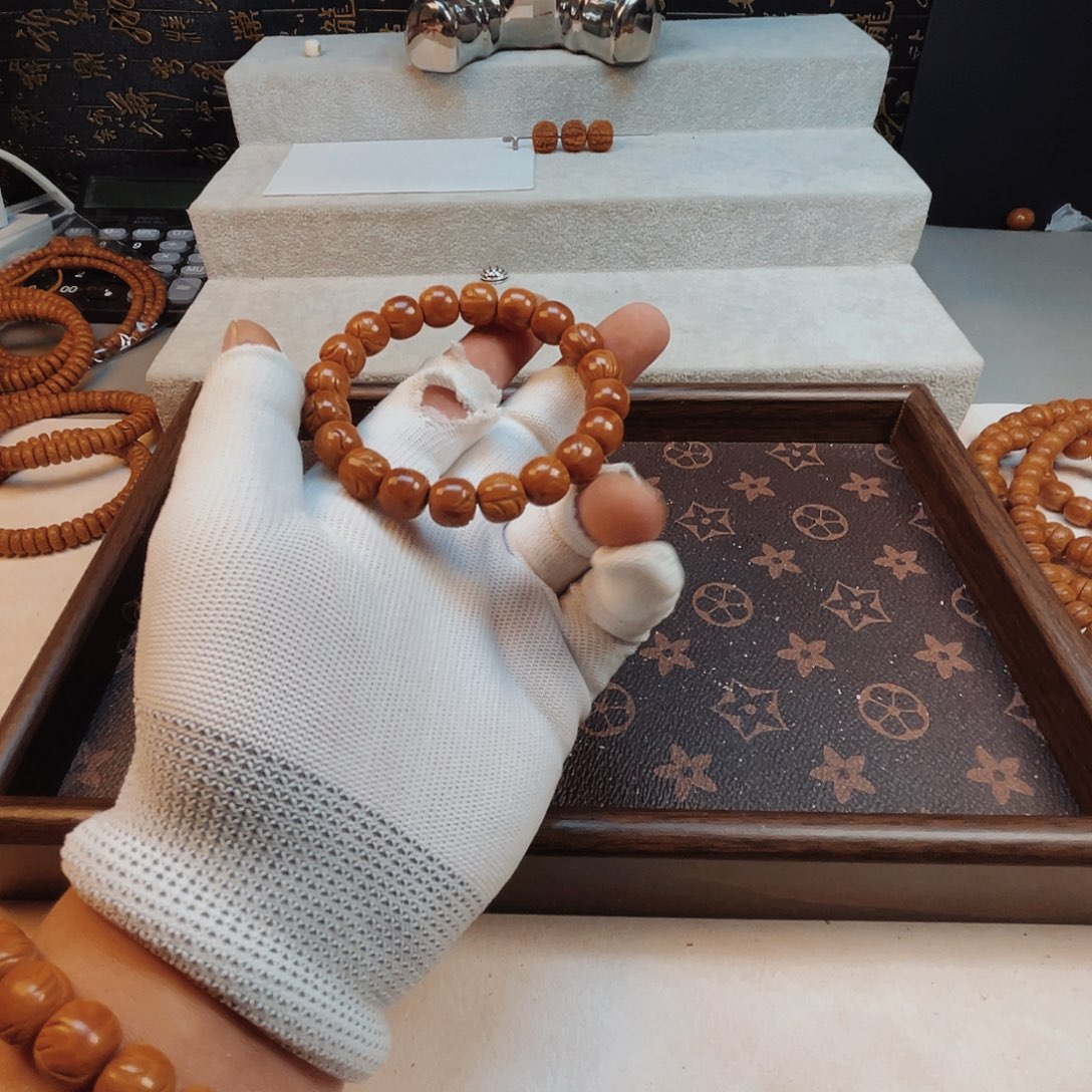 桃核吊坠龙文10老型手串