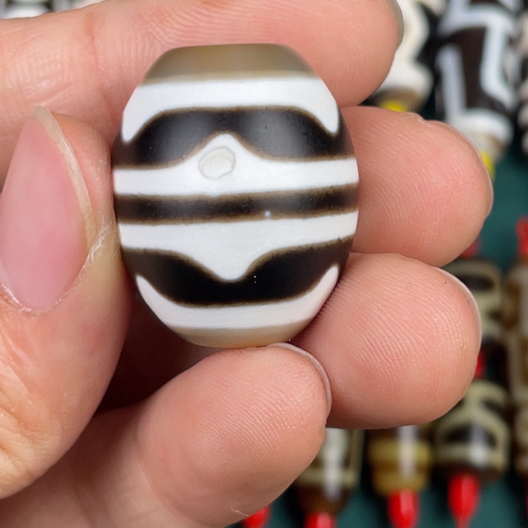 玛瑙/玉髓裸珠双虎牙