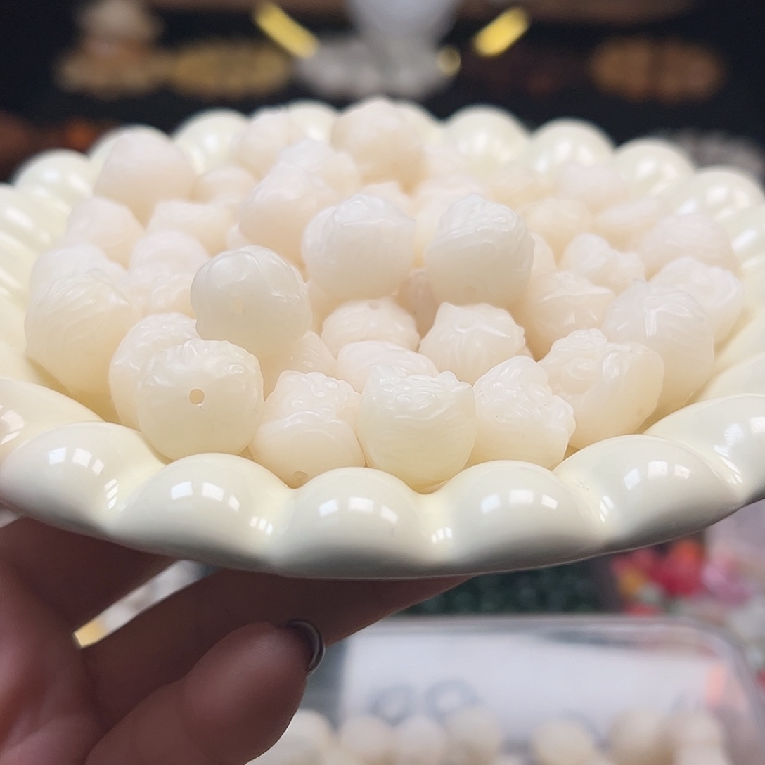 菩提根/象牙果手串瑕疵白醒狮20颗有裂