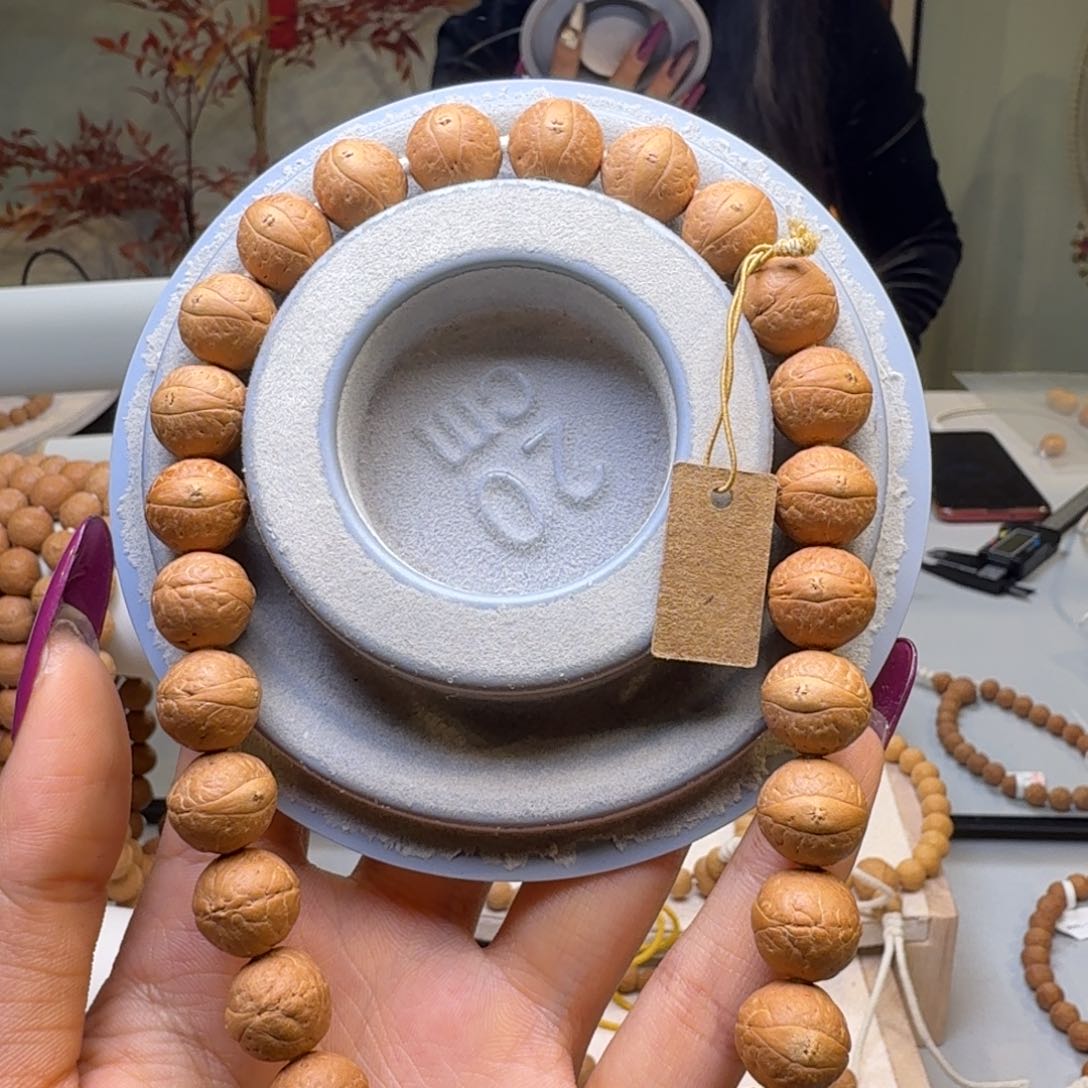 凤眼菩提吊坠12.5手持