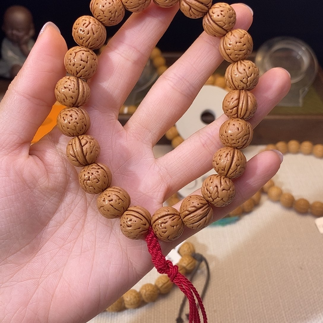 桃核手串14红皮一根筋