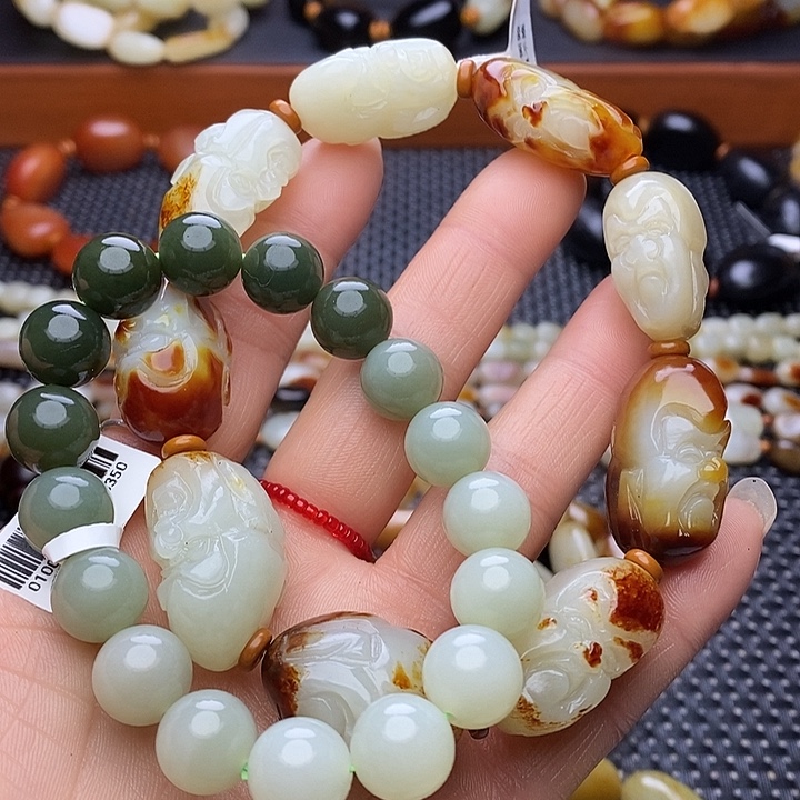 戈***铃和田玉未镶嵌手链