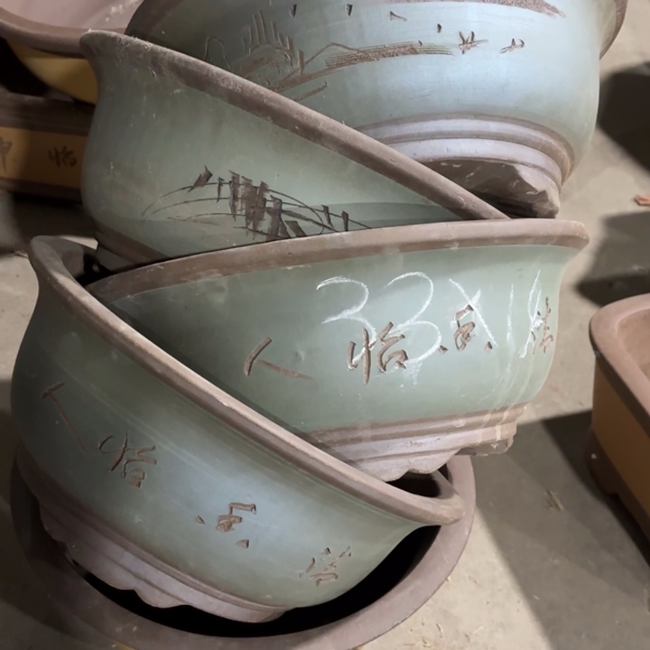 紫砂花盆 100-5。  33-14