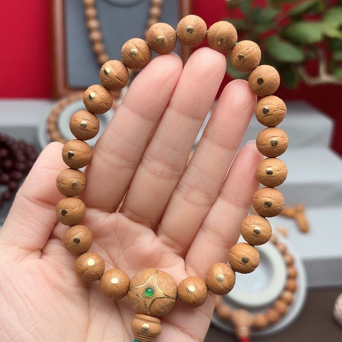 凤眼菩提手串11左右铜钉镶嵌手串
