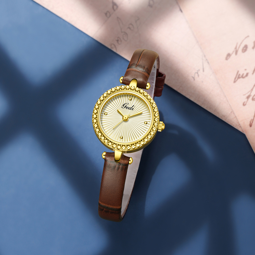 独特魅力圆形放射设计真皮女表精致小巧时尚气质女士石英手表