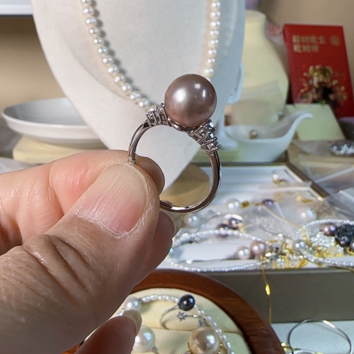 银S925镶嵌海水珍珠9左右金属紫光圆珠有一个点