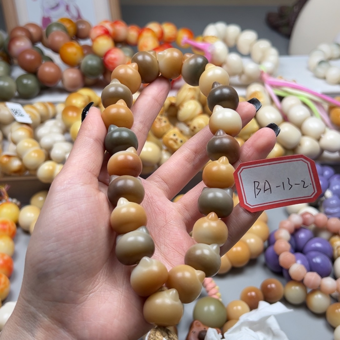 吊坠菩提根/象牙果尾货BA13-2猫头手持一串17m