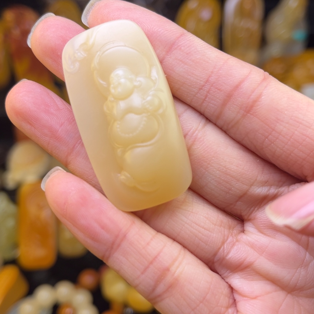 徒***家石英质玉未镶嵌黄蜡石吊坠