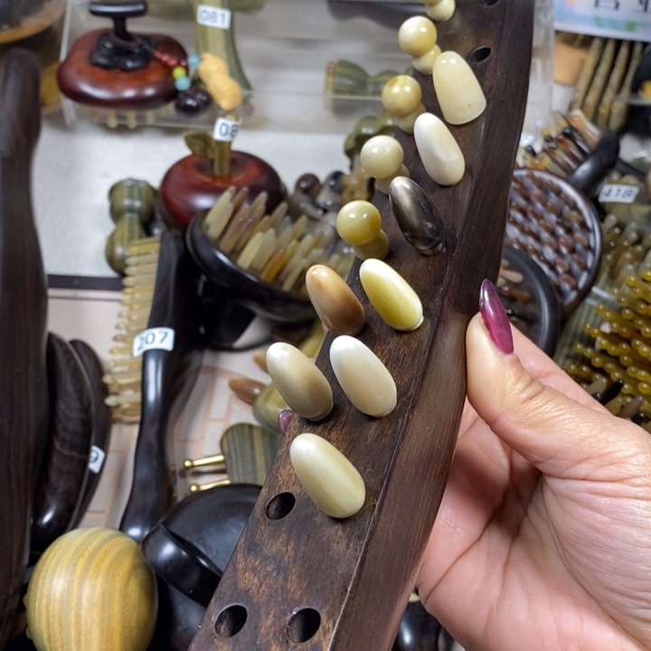 紫光檀20齿牛角赶筋棒