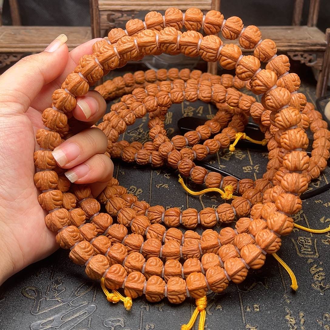 吊坠桃核赤金风雨手持