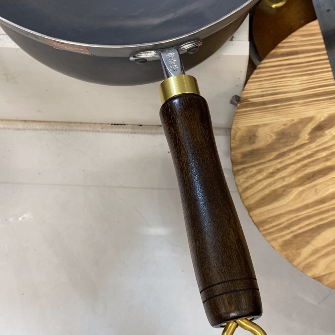 纯钛瘦**?补木把32纯钛炒锅的差价