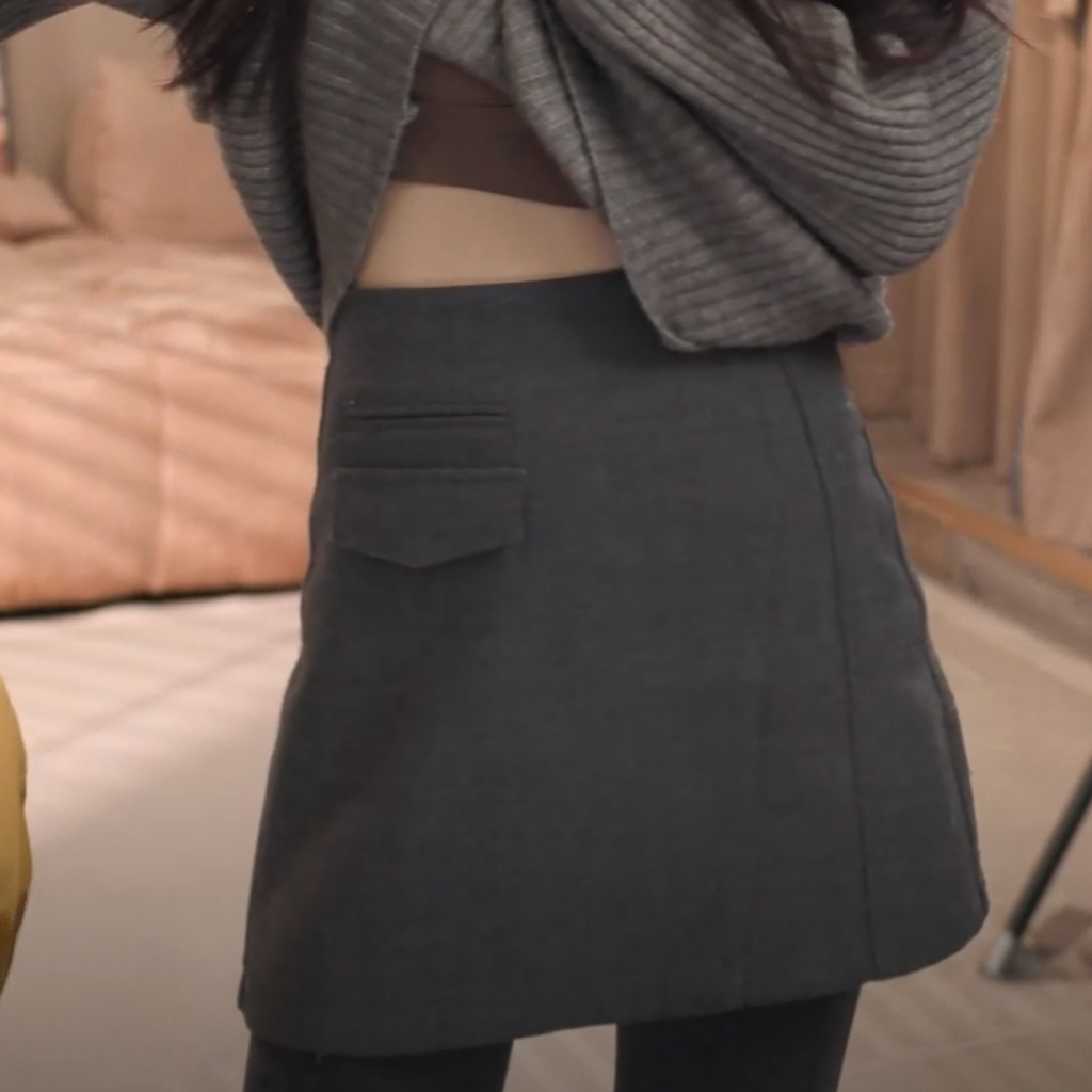 韩版高腰显瘦纯色不规则A字裙短裙子2025秋冬新款时尚包臀半身裙