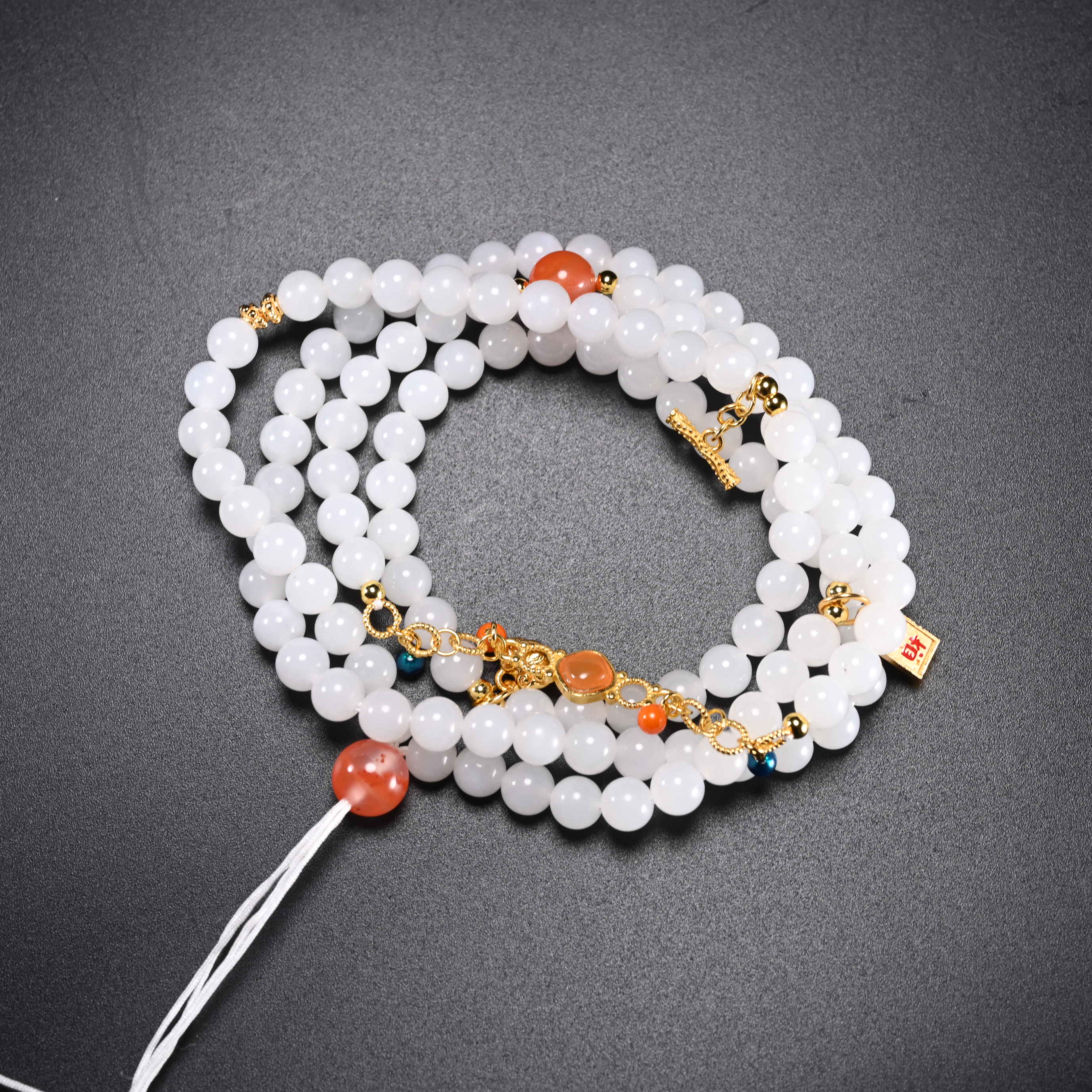 lot12和田玉珠链/保利