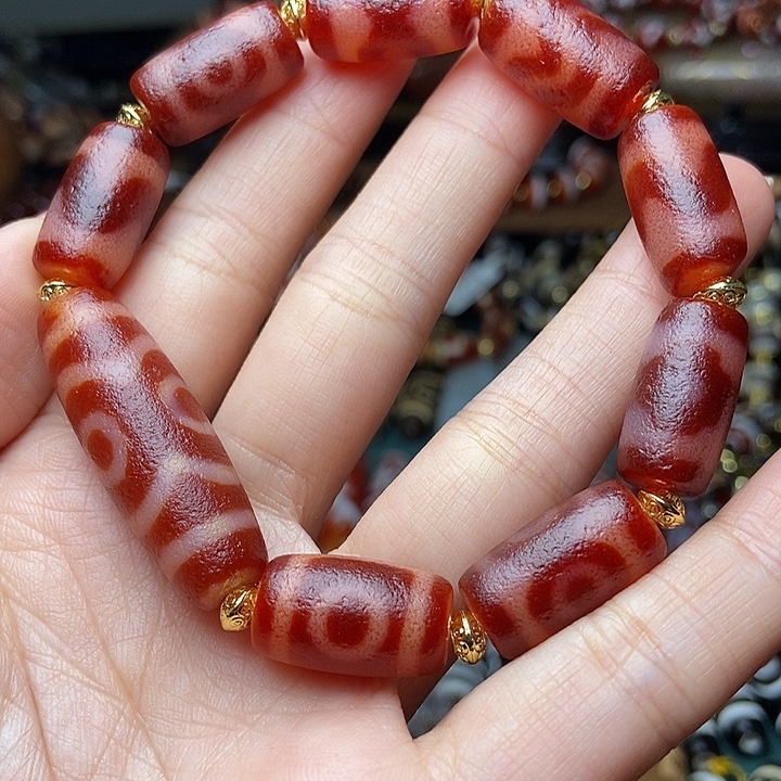 珍***米红肉多宝天珠手串1