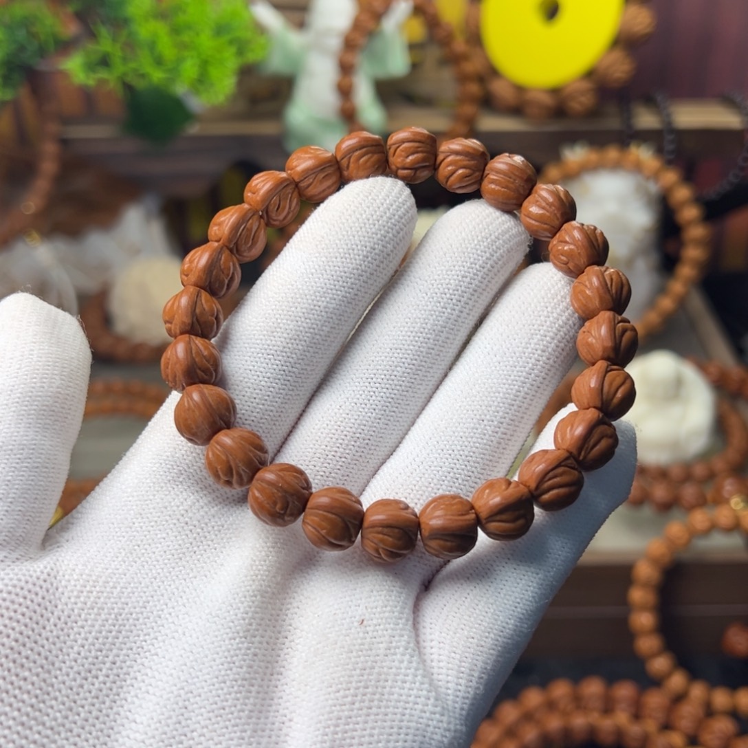 咣***咣桃核吊坠野生子手串10