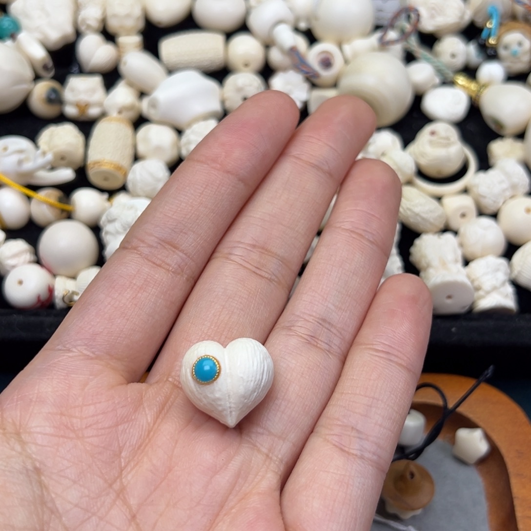 优***）猛犸象牙吊坠17mm屁桃镶嵌