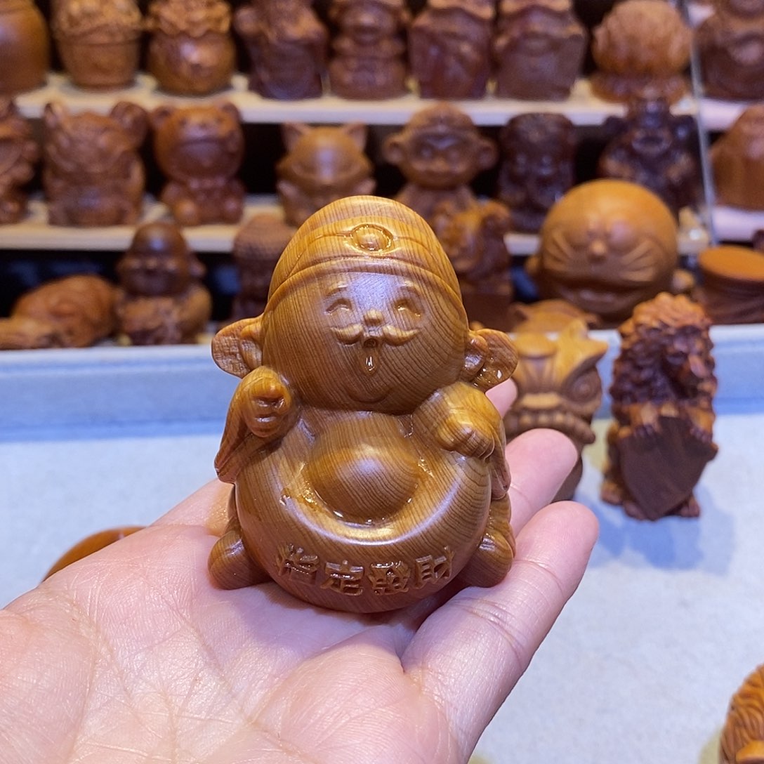 秋***韵木崖柏木雕手把件