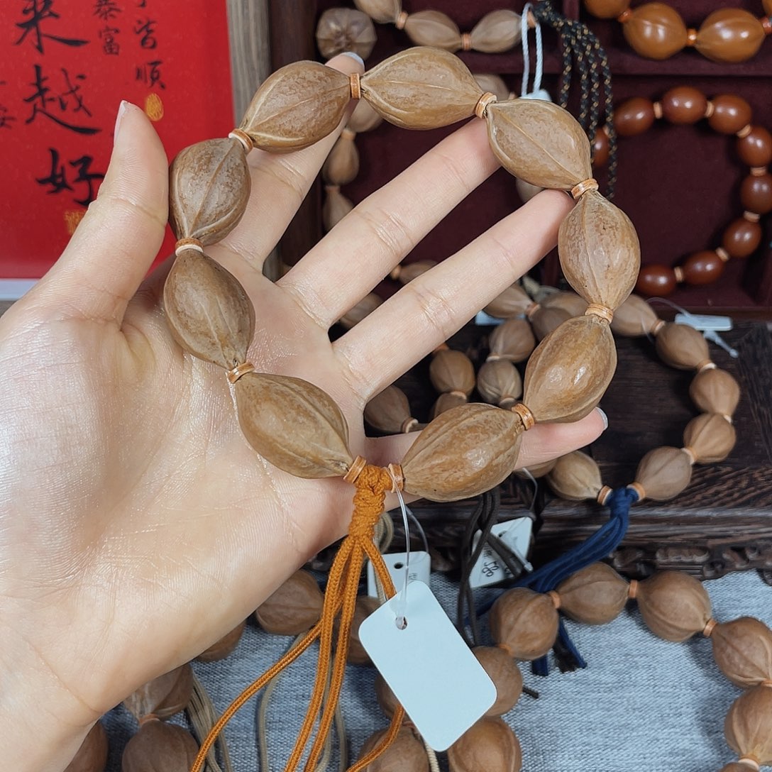 Y***橄榄核手串梅林铁核19.30