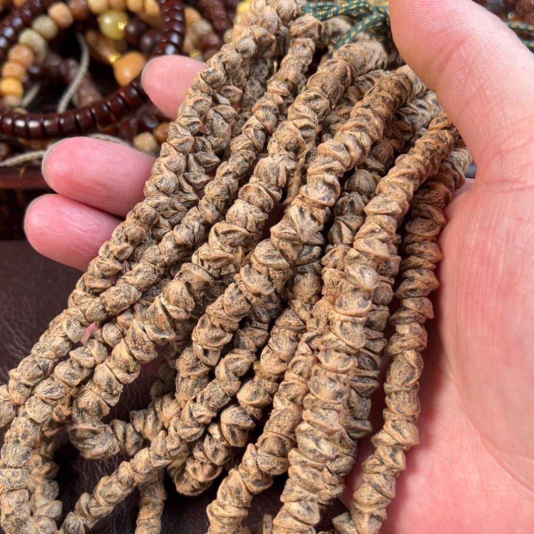 吊坠星月菩提百香籽手持